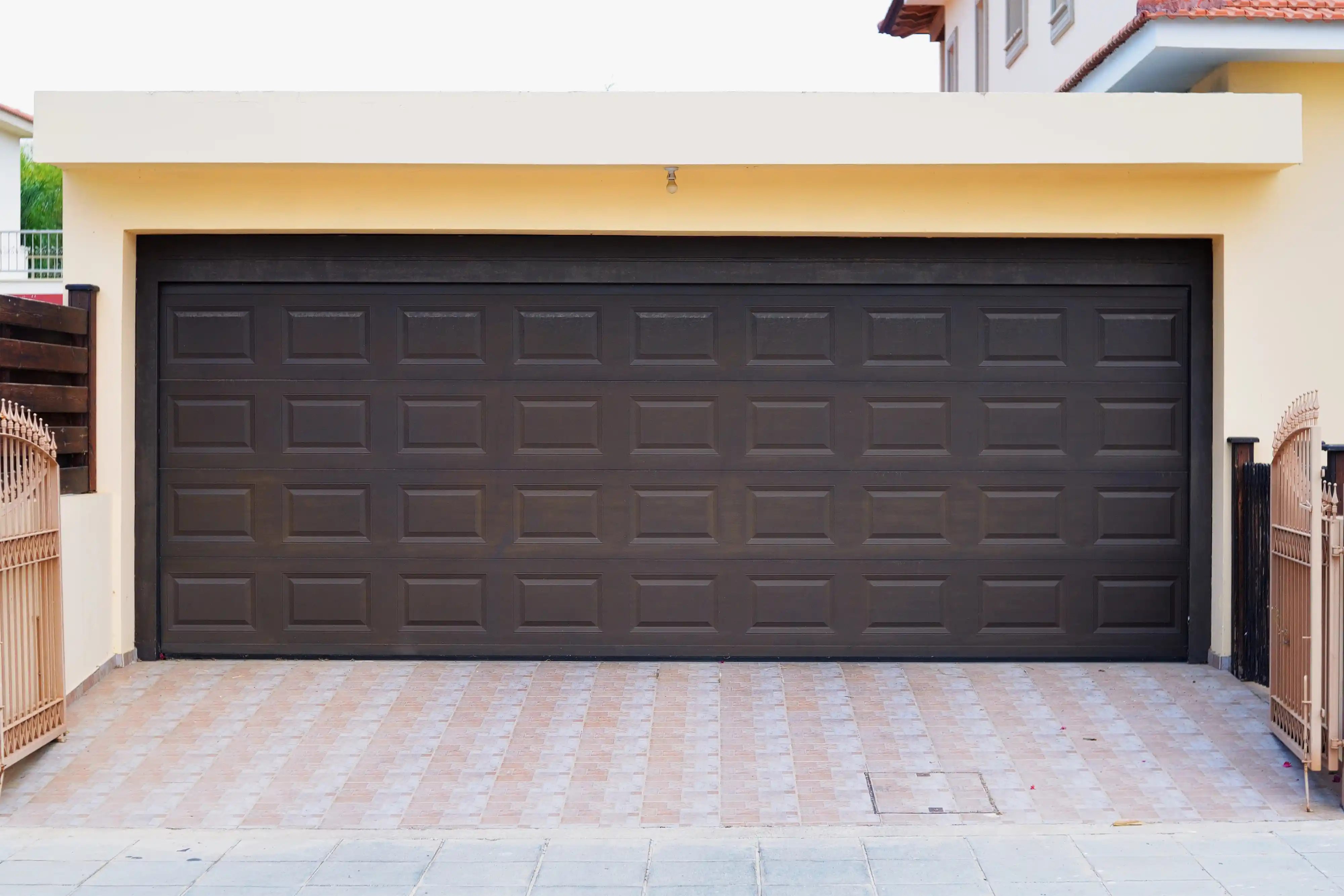 Garage door installation contractor working on a home in West Jordan